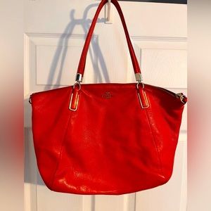 Authentic RED hot Coach satchel with 3 inside pockets.